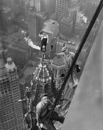 Working at high Woolworth Building, New.jpg