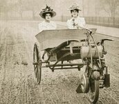 1902.  Two Young Ladies in a Lawson's Motor Wheel.jpg